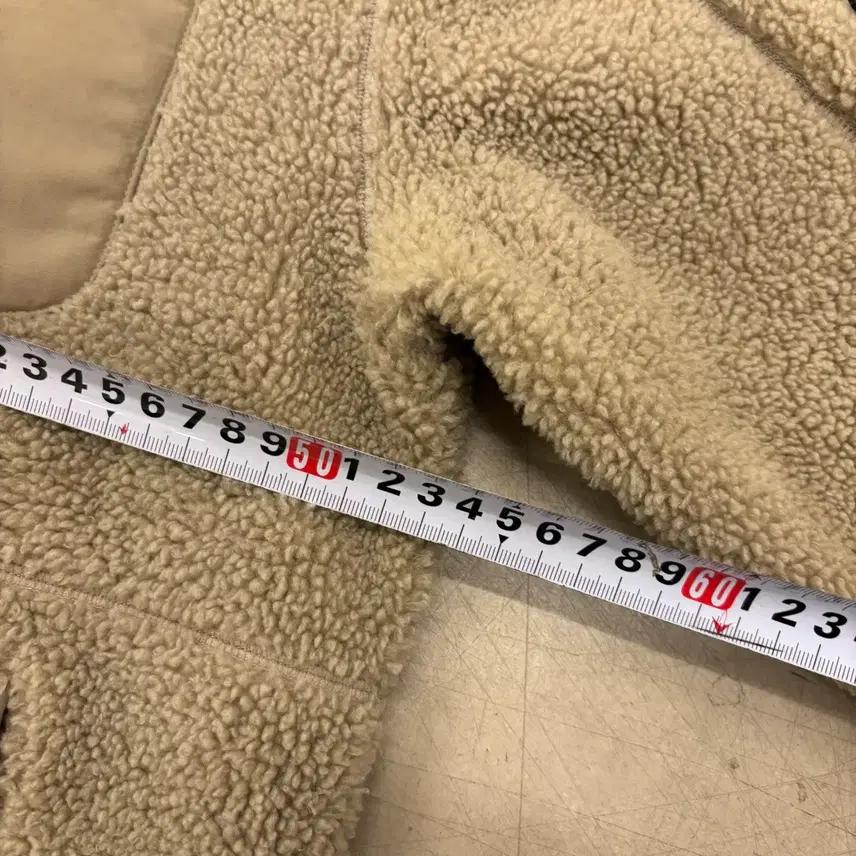 디스커버리 베이지 플리스 스몰로고 집업 6