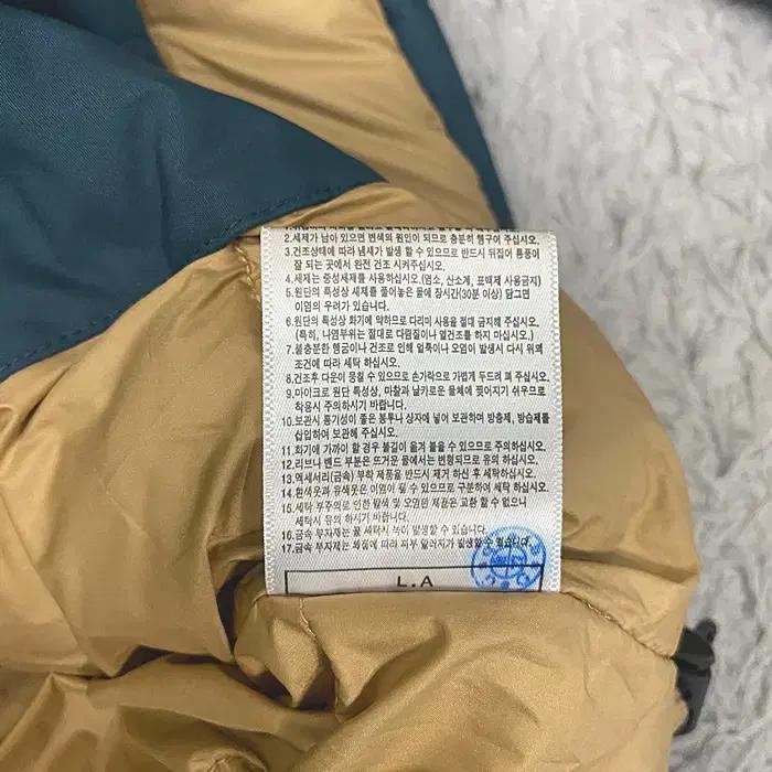 뉴발란스 오리털 패딩 점퍼 너구리털 90 8