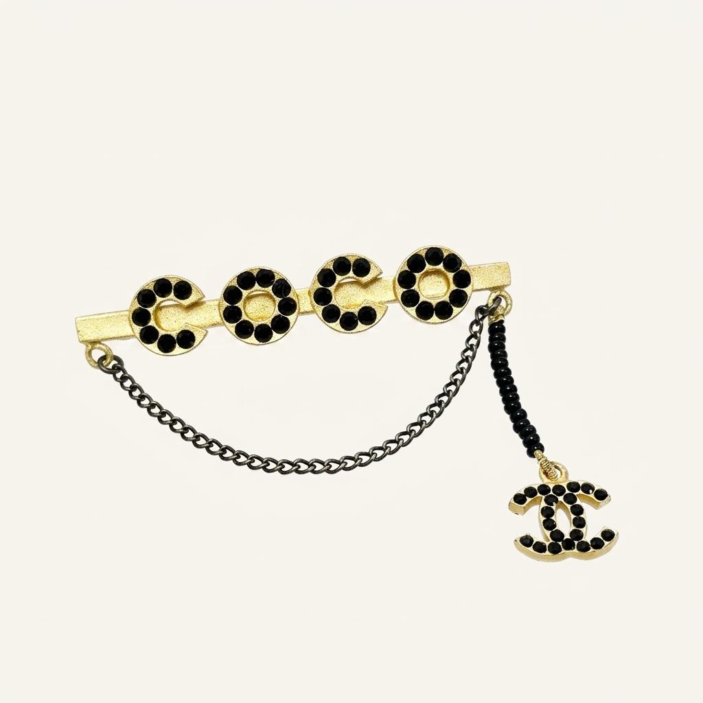 샤넬 COCO 라인 블랙 스톤 금장 브로치 5VCHA26583 1