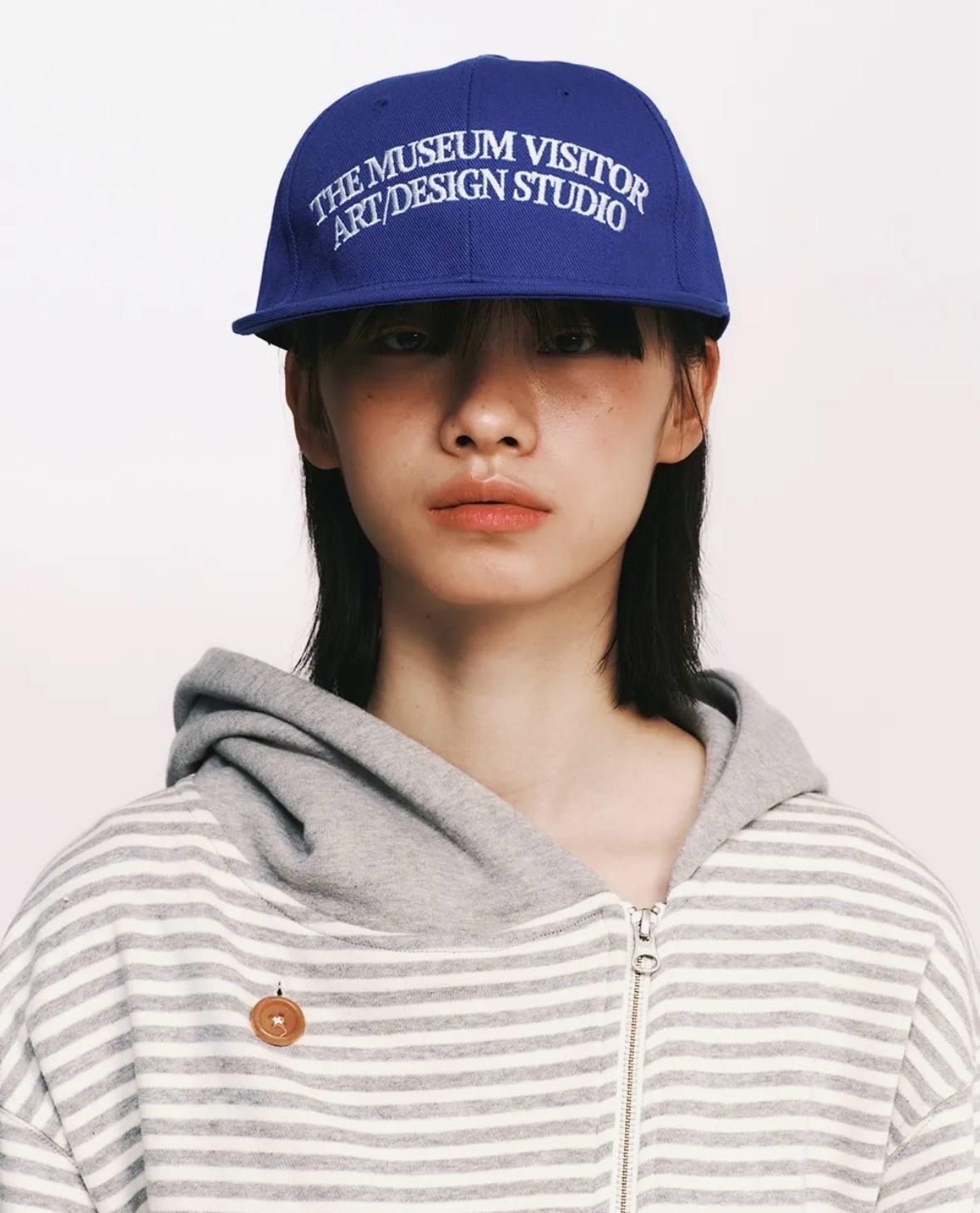 더뮤지업비지터 모자 3