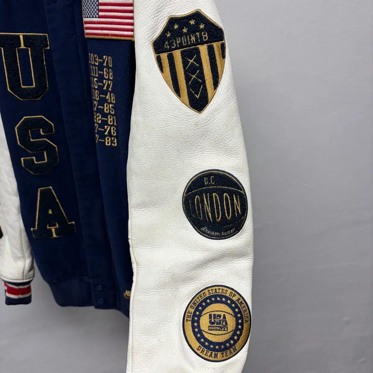 나이키 NSW USA 바시티 9