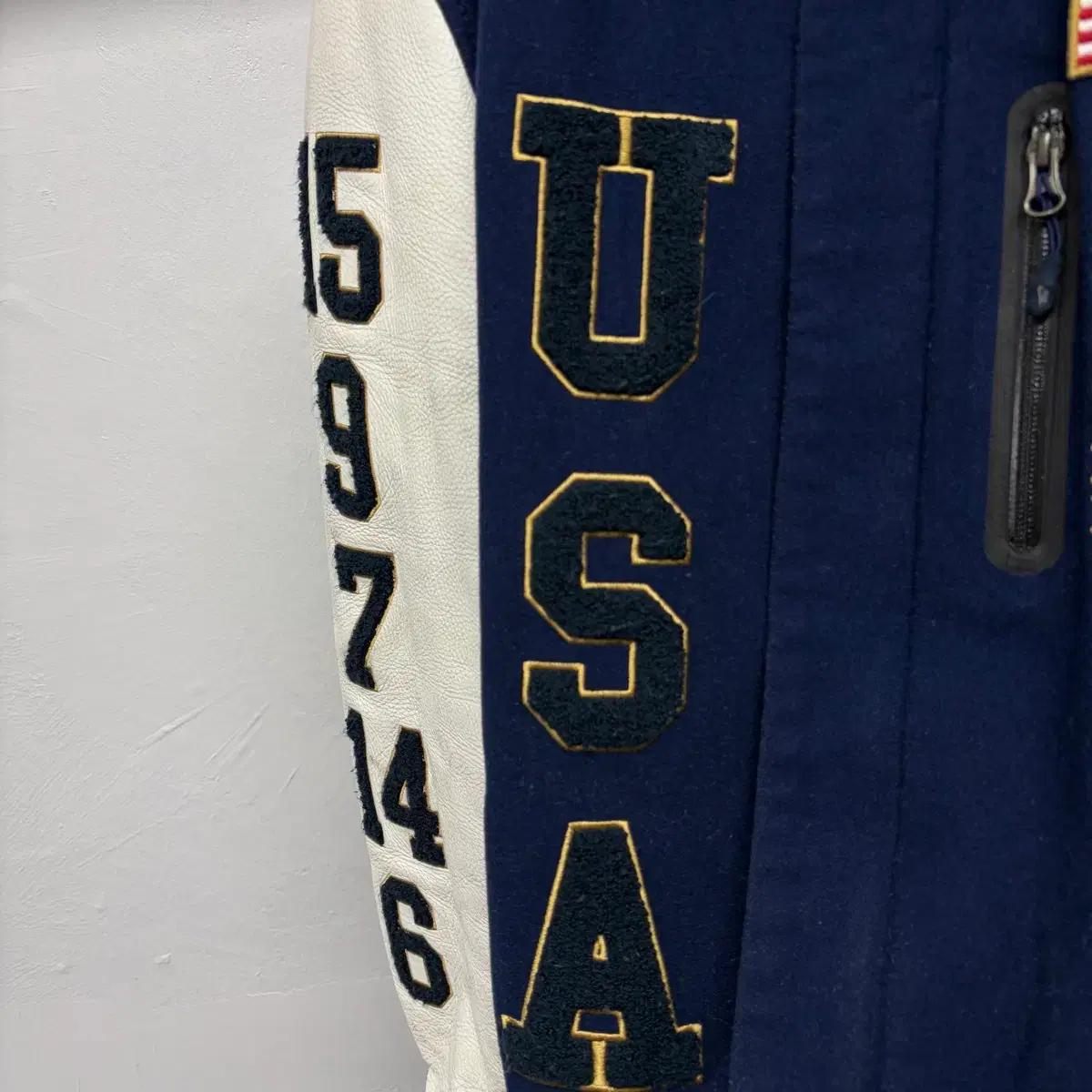 나이키 NSW USA 바시티 7