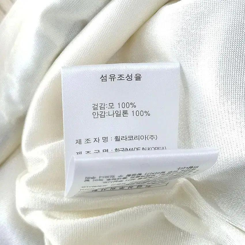 휠라골프 여 방풍 목폴라 민소매니트티 베이지 (HU27904) 9