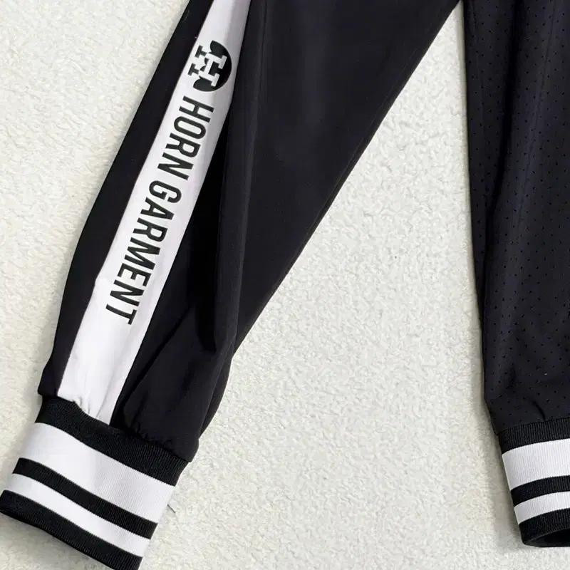 HORN GARMENT 블랙 솔리드 경량 펀칭 윈드브레이커 L 4