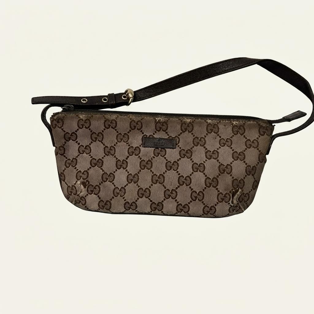 Gucci GG canvas mini pouch bag 1