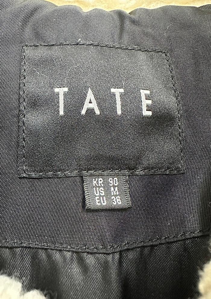 tate (M) 6