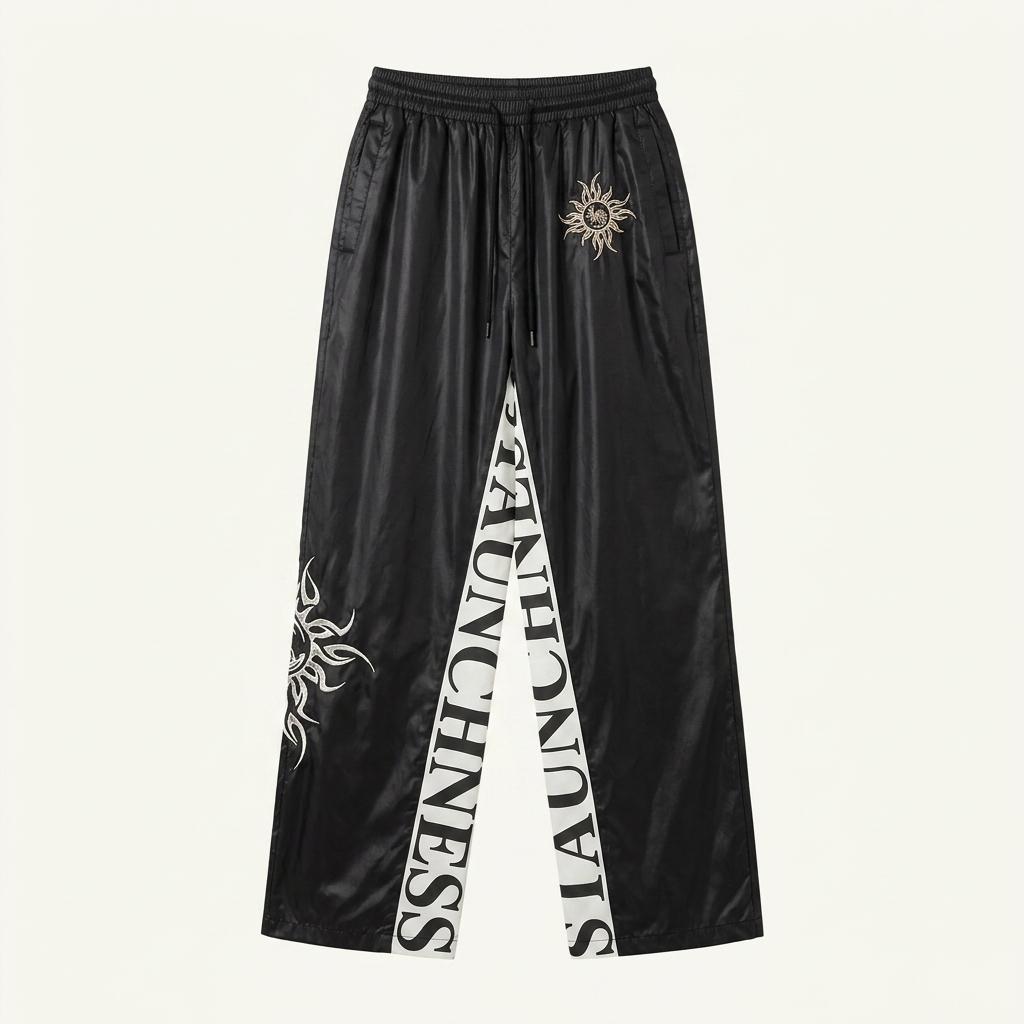 Black leg graphic nylon track pants 1