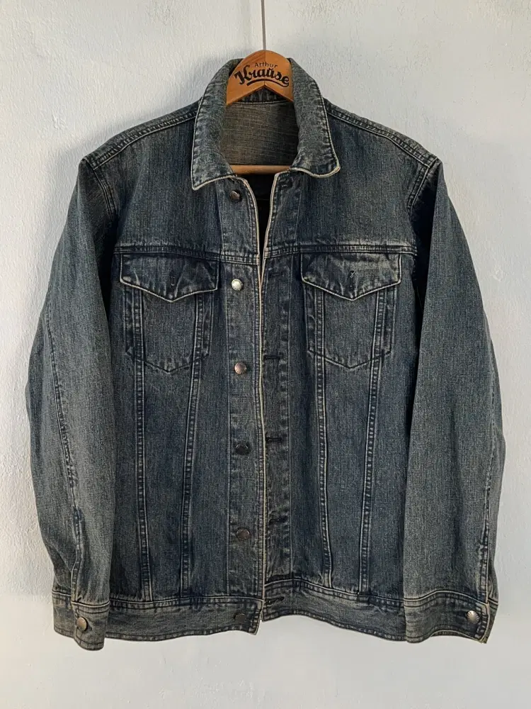 Person's denim jacket 3