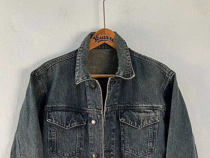 Person's denim jacket 4