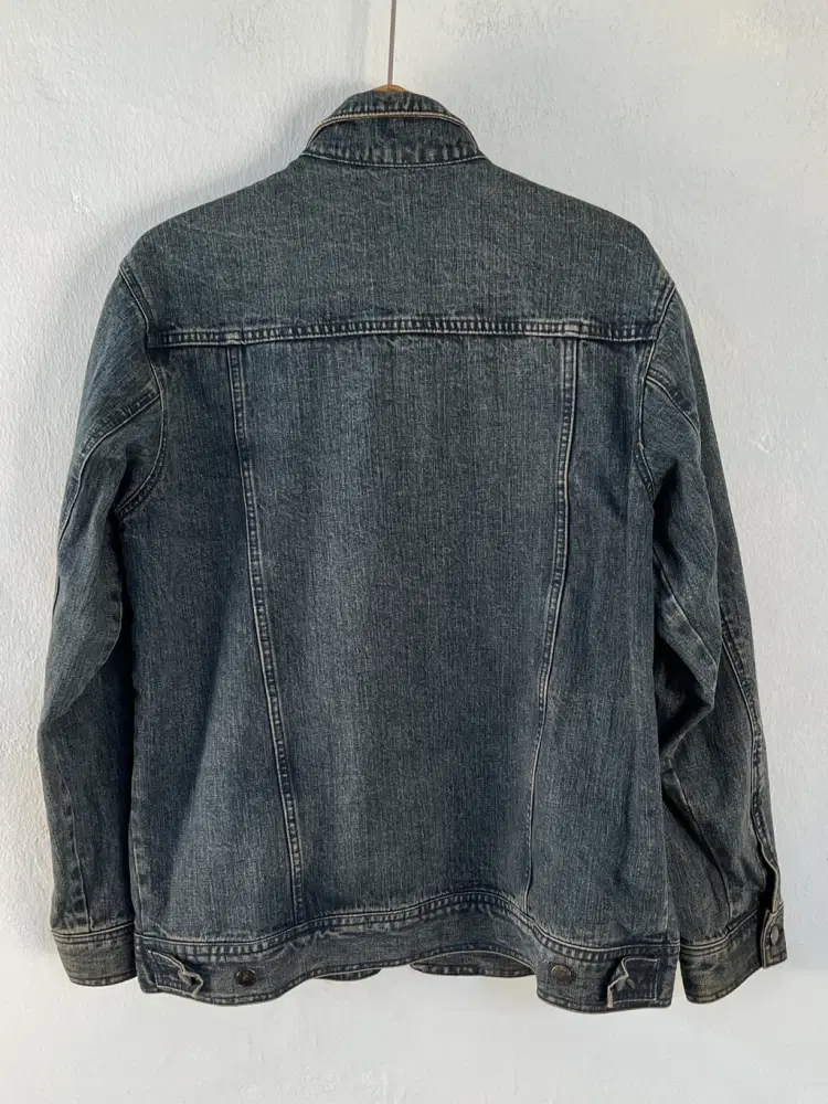 Person's denim jacket 7