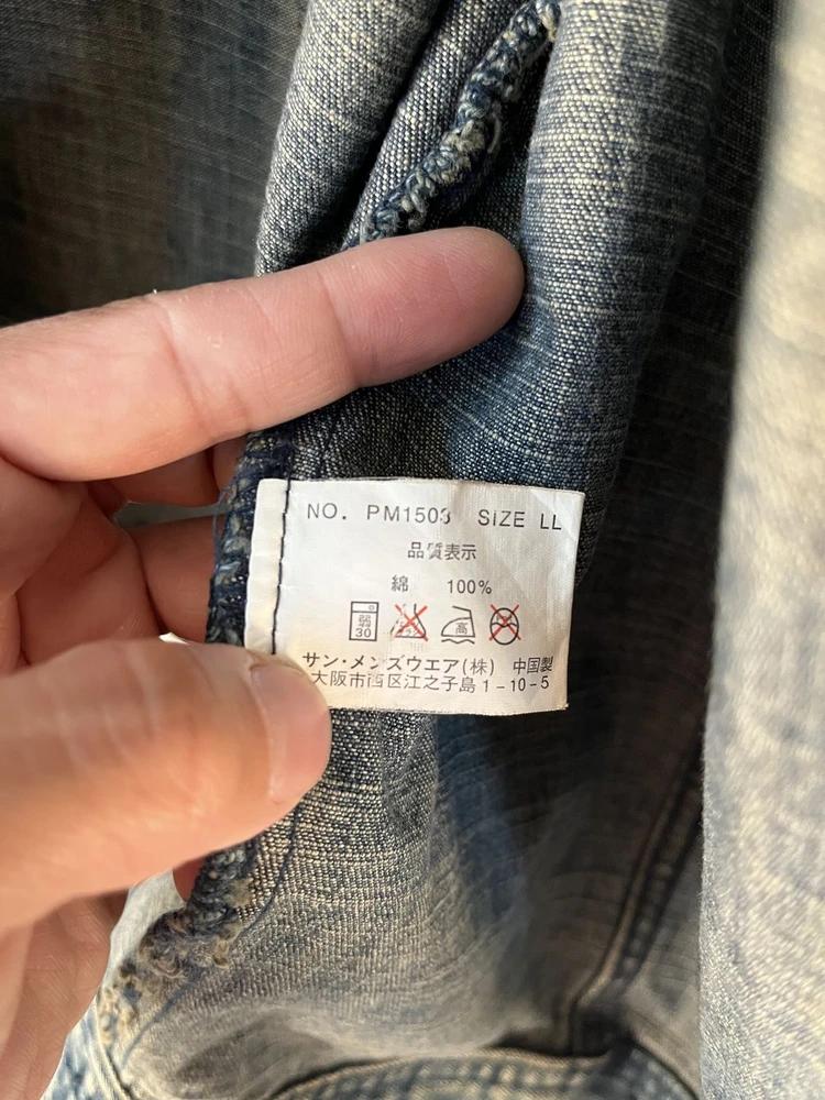 Person's denim jacket 9