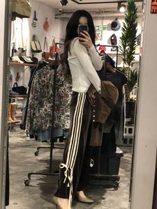 Brown velour track pants +to 2