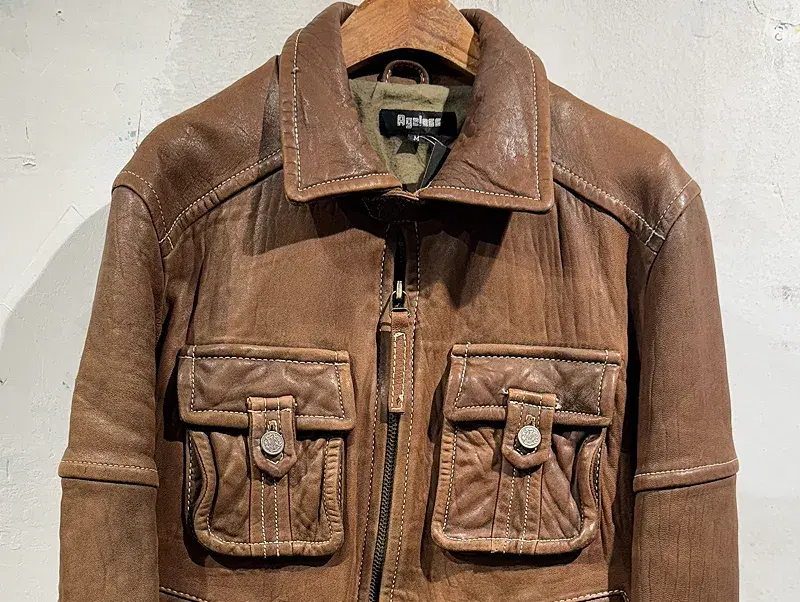 Ageless brown leather jacket +to 6