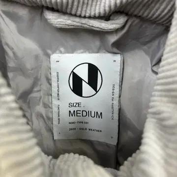 네스티킥 골지 스몰로고 패딩 4