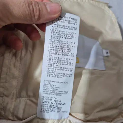 내셔널지오그래픽 아이보리 경량 패딩 4