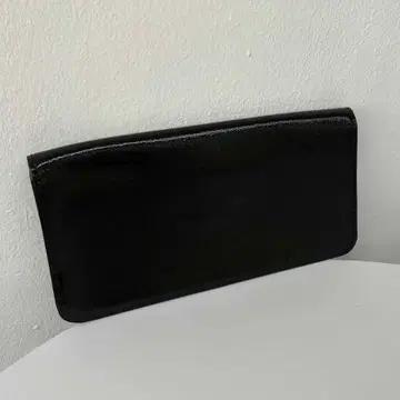 토리버치 페이던트 레더 지지 클러치 백 3