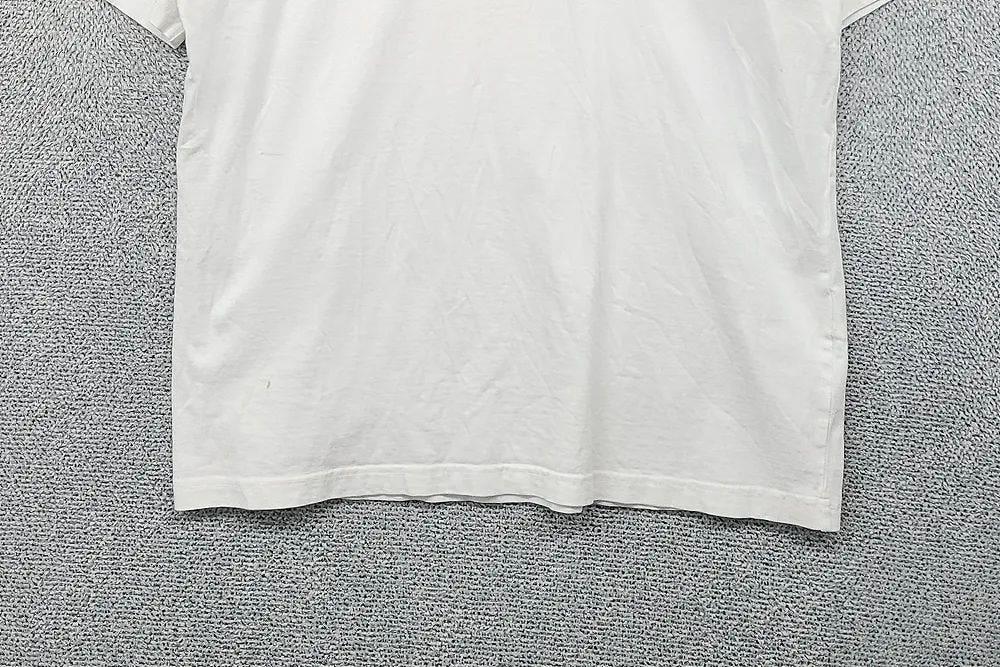 휠라 프린팅 화이트 반팔티 LARGE 6