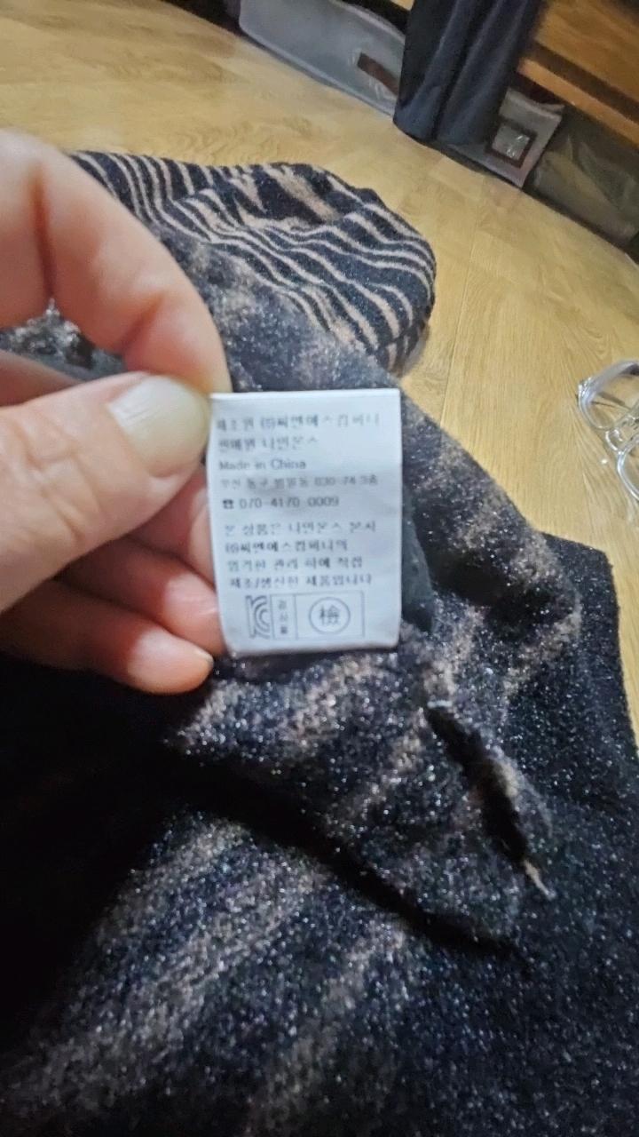 나인원스 지브라 패턴 크롭 니트 집업 7
