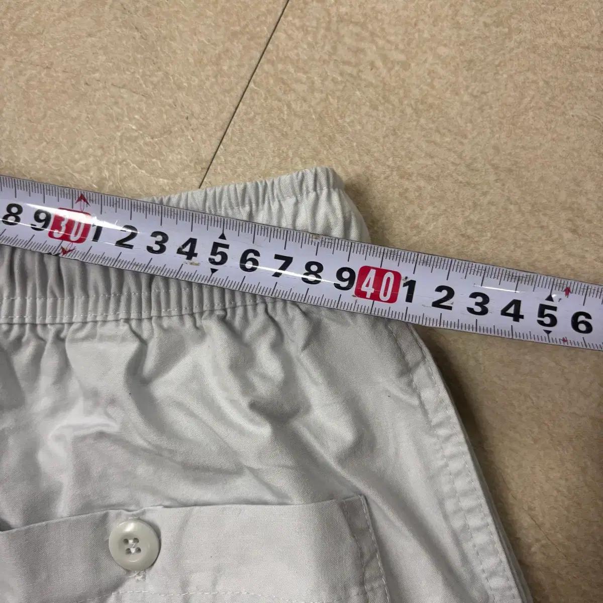 나이키 오버사이즈드 시멘트 컬러 하프 팬츠 8