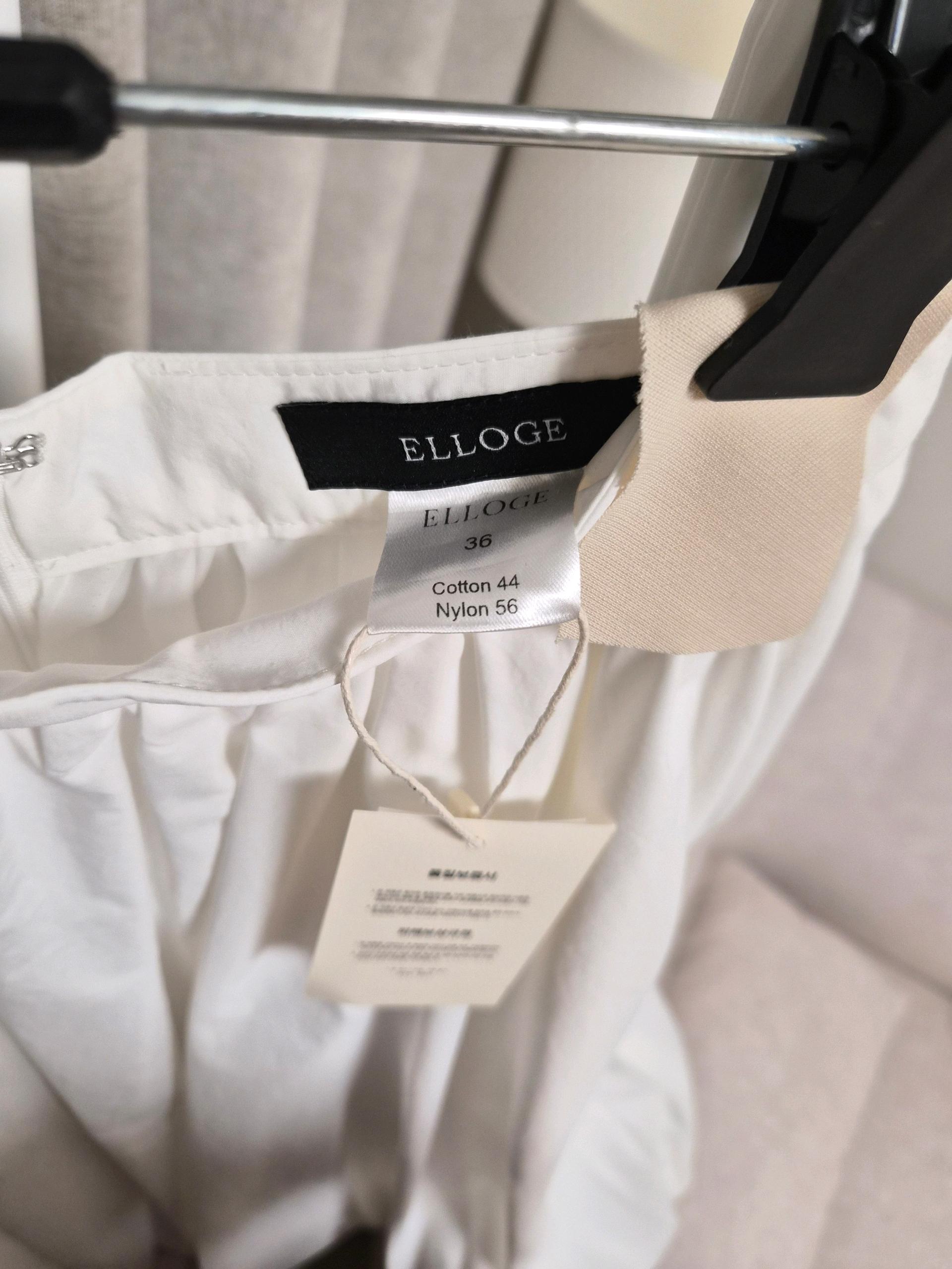 ELLOGE Joy Puffball Skirt 엘로주 조이 퍼프볼 스커트 화이트 4