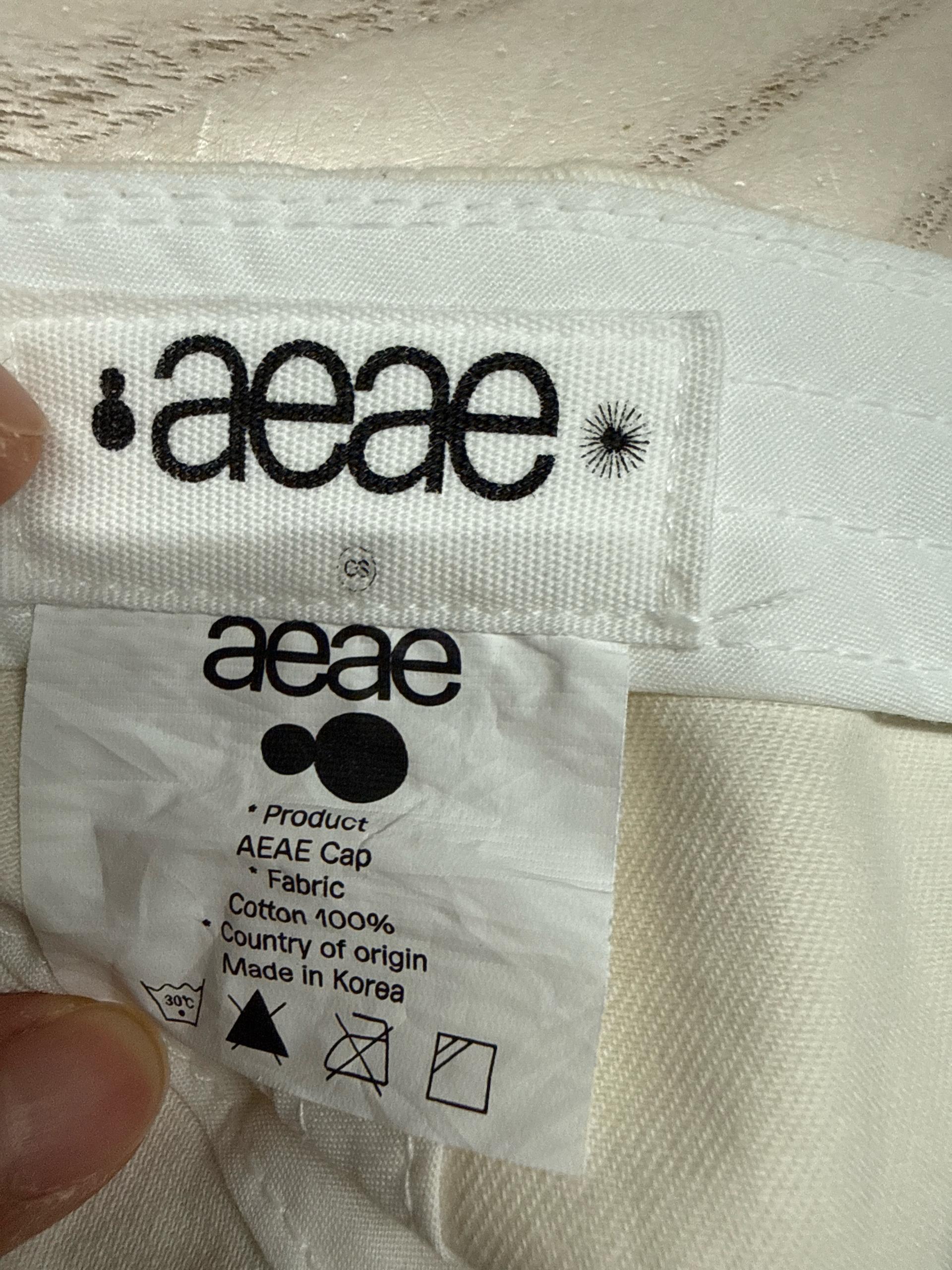 aeae 레터링 그래픽 볼캡 화이트 블랙 4