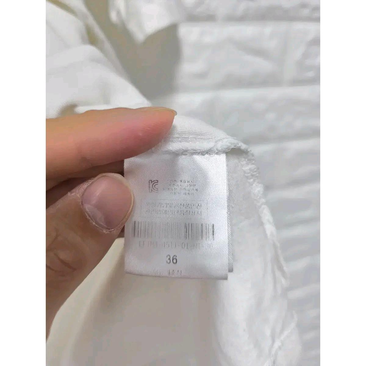 L 럭키슈에뜨 화이트 반팔 티 D671 4
