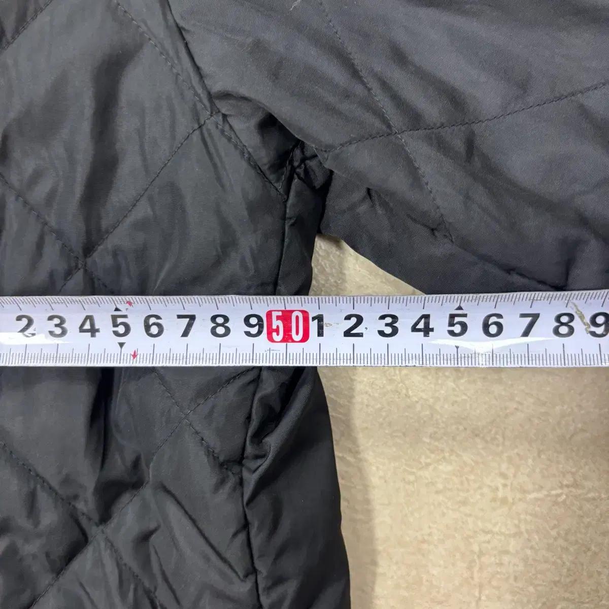 나이키 스우시 스톰핏 퀼팅 자켓 6