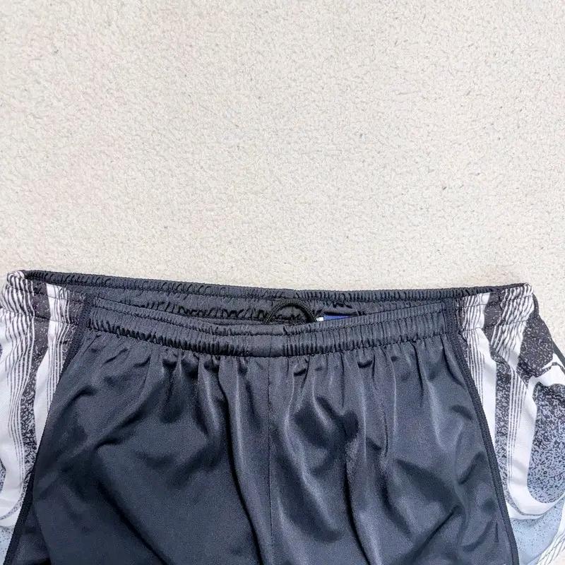 ASICS 러닝 쇼츠 M 3