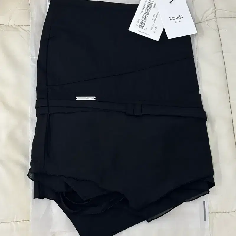 미세키서울 Diagonal sheer string mini skirt 7
